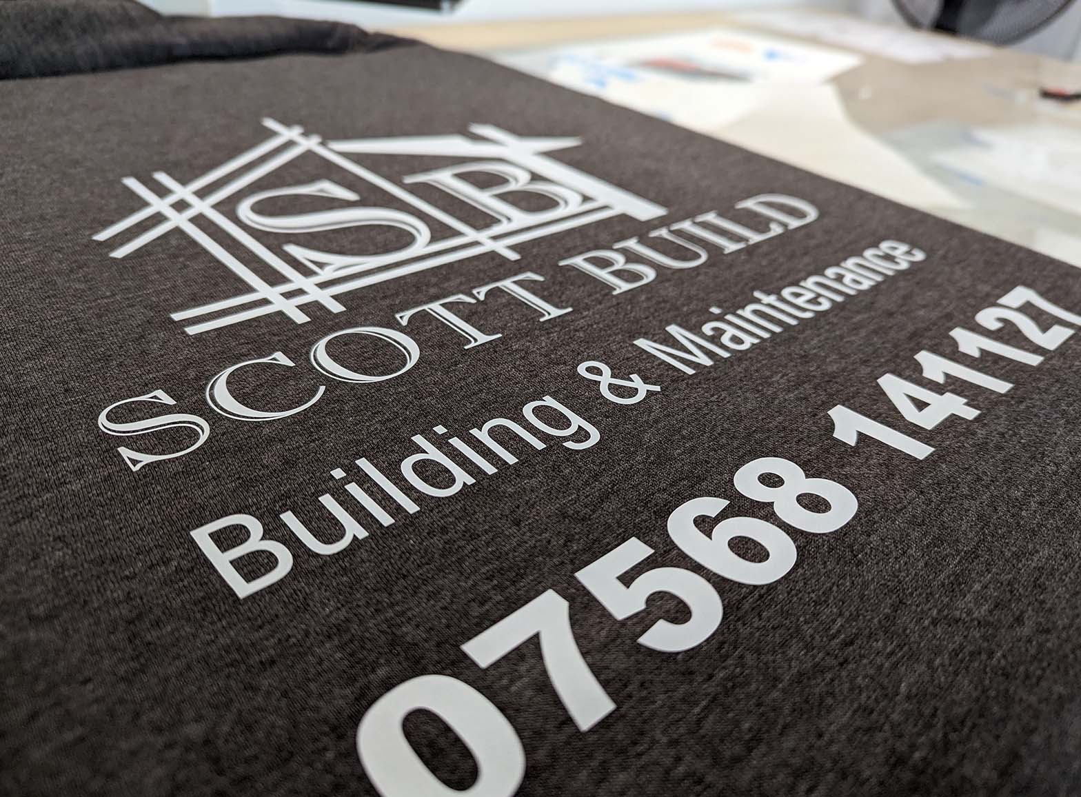 A photo of the Full Colour Vinyl Print process for a job for Scott Build, completed by Clothing Your Way in Paignton, South Devon.